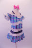 Plaid dress in shades of blue aqua and pink, has denim halter straps, waistband and crystalled faux boning accents. A wide white eyelet lace trim lines the off-shoulder top, pouffe sleeves, bust and waist. Comes with pink bow hair accessories. Side