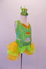 Two-piece costume is a pearl beaded sequined neon green halter half-top with gold sequined inlays. Matching green bottoms have a sequined waistband with money-symbol appliques at each hip. The open front bustle skirt is layers of green & yellow organza. Comes with matching wrist cuffs & mini green glitter top hat. Side