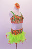 Orange and green two-piece beaded sequined costume has beaded sequin leaf accents along the neckline and waistband. The bottom has an attached lime green organza ruffled skirt with large dangling orange sequins accenting the edge. Comes with a large orange floral hair accessory. Side