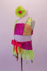 Fuchsia beaded sequin three-piece costume has bandeau style top with sheer pale green sequined sides that become the bands of the halter collar. The tie skirt is a wide beaded pink waistband with sheer pale green chiffon skirt that has green dangling circle sequins. Comes with green & pink floral hair accessory. Left side