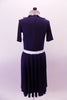 Navy blue vintage style dress has white Peter Pan collar and waistband the vertical front, lace ruffled accent band gives the costume its sweet innocence. Comes with a white ribbon hair accessory. Back
