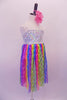 Empire waist camisole dress has a white sequin bodice and sheer knee-length rainbow coloured skirt with wave design. Comes with a curly pink hair accessory. Side