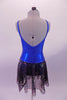 Shiny blue princess cut leotard dress has a low scoop back and an attached sheer black skirt with iridescent sequin detail. Simple yet pretty as a base of finished costume. Comes with a gold hair accessory. Back