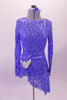 Soft blue sequined angle dress has long sleeves and an open back with center reinforcing back strap. The right side of the skirt is shorter with a large crystal brooch accent at the hip Comes with matching blue hair accessory. Front