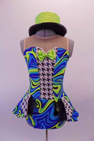 Leotard style costume with open front peplum style skirt that gives a theatrical flair. The kaleidoscopic swirls of blues & greens are contrasted with the black and white houndstooth pattern at the center of the torso and front of the open skirt. Comes with sequined lime green bow tie & green sequined top hat. Front
