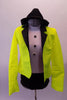 Two-piece costume has a black and white leotard base with black brief style bottom and high neck white, zip back sleeveless top with black jewelled button accents. The bright neon yellow blazer with black lapels is what really makes the bold statement. Comes with a black fedora. Front