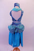 Turquoise 2-piece Arabian themed costumes has a fully sequined low-back, tank style half-top. The bottom is a brief with sequined bubble pouffe full bustle with long open front, knee length, turquoise taffeta skirt. The edge of the skirt is trimmed with silver lace that matches the silver & blue waistband & genie hat. Back