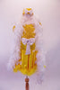 Yellow dress has sequined bodice with round neck, low scoop back & pouffe sleeves. The high waistband has a large white bow at front. The attached metallic yellow skirt has yellow marabou trim & matching white bow accents at the side gathers. Comes with a white feather boa, & a yellow pill hat with bow & birdcage veil. Front with boa