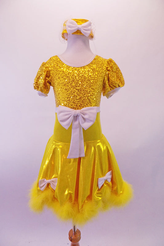Yellow dress has sequined bodice with round neck, low scoop back & pouffe sleeves. The high waistband has a large white bow at front. The attached metallic yellow skirt has yellow marabou trim & matching white bow accents at the side gathers. Comes with a white feather boa, & a yellow pill hat with bow & birdcage veil. Front