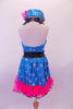 Turquoise fully sequined, silver polka dot halter dress has black waistband and collar. Hot pink ruffled petticoat sits beneath the dress and compliments the matching polka dot pill hat with pink pouffe accent. Back