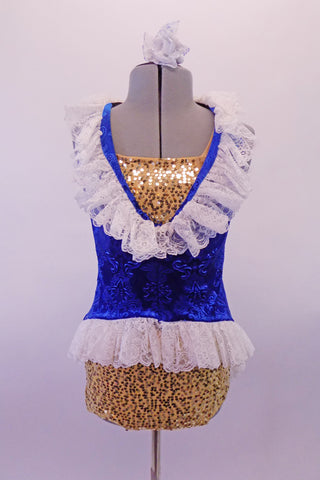 Three-piece costume has a gold half top and briefs which sit below a blue velvet brocade tunic. The tunic is a V-neck with white lace ruffle at the neckline and hip and floral bow accent at back. Comes with lace ruffled velvet gauntlets. Front