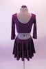 Two-piece purple costume has a long-sleeved haft top with V-front neck, low scoop back and glitter design front. The matching short chiffon circle skirt has angled glitter design and attached brief. Comes with a floral hair accessory. Back