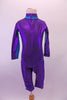 Biker length unitard is a purple metallic diving suit with teal stripe at sides, sleeves and collar.  It zips along the front all the way up to the neck. Comes with teal swimming cap with chin strap and purple sequin flower buttons. Front