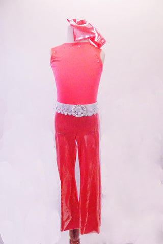 Coral crystalled tank top with scoop back is accompanied by coral shimmery pants. A white leatherette laser cut lace belt and matching wristbands accent the outfit. Comes with matching hair scarf. Front