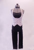 Black pants are accompanied by a black bandeau top that sits beneath a white velvet swirled vest tailcoat with crystalled buttons. Comes with a black bow tie that ties around the neck. Front
