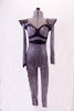 Funky silver and black optical illusion patterned full unitard has black leatherette accents at the bust and peaked shoulders. Front