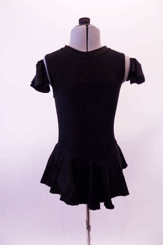 Black leotard dress has a short flowy peplum skirt that attaches in a low front/back princess cut waistline. The back is an open keyhole. Comes with ruffled armband accessory. Front