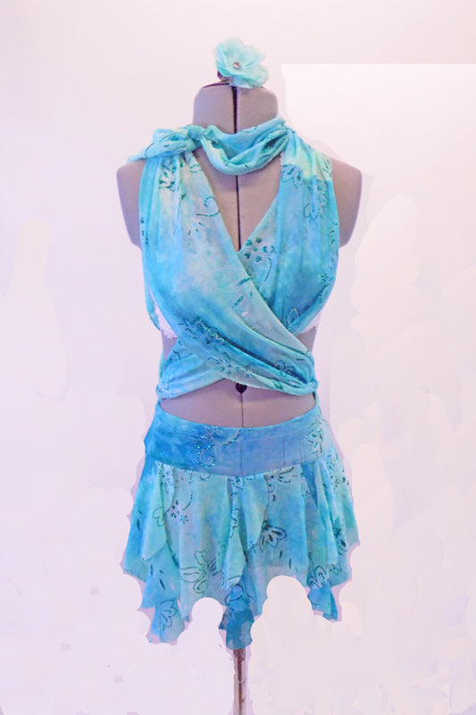 Light blue marble costume with glitter floral design is the base of this 3-piece costume. The short kerchief hemline skirt has a wide waistband with loops. A wide shawl drapes behind the neck & crosses over the front torso covering the white lace bra, then loops through the waist, crossing at back & ties at the neck.  Front