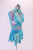 Light blue marble costume with glitter floral design is the base of this 3-piece costume. The short kerchief hemline skirt has a wide waistband with loops. A wide shawl drapes behind the neck & crosses over the front torso covering the white lace bra, then loops through the waist, crossing at back & ties at the neck. Side