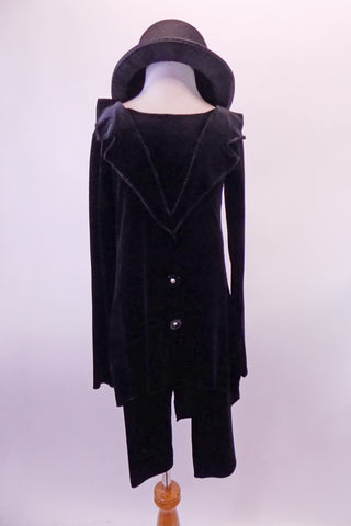 Quirky black velvet tunic style tailcoat has a faux collar and large front buttons. The black velvet ¾ length pants and black top hat create a fun yet creepy feel. Front