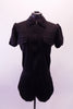 Black short unitard with zip-front and lapelled collar has a black bra top that goes underneath. The costume can be worn zipped half-way or fully. Front