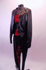 Three piece-costume has a faux leather jacket that sits over-top of a red sequined half-top. The outfit is complete by black drop-crotch harem pants with red plaid waist and crotch area. Side