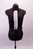 Black sequined leotard with cummerbund waistband. Has a bowtie collar with a ruffled white pleated accent. Comes with satin-lapeled tuxedo tailcoat and top hat. Front no tails or hat