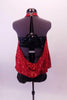 Red sequined halter bubble top has a low drop back that reveals the attached leatherette bandeau bra, leatherette shorts and black sequined zip front jacket. Back