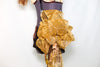 Caramel bra, brown velvet piping and flowers. Gold organza pouf on right shoulder. Shorts are brown velvet with crystal detail, large bow/pouf on the right hip, side zoom