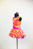 Dress has a wave of orange and yellow with white/pink flowers with crystal centers, side