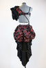 3 piece costume, red/black glitter velvet, with large shoulder pouf and bustled calf-length skirt, back.