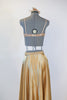 Gold shiny spandex brief, gold sequined bra and long flowing, ankle length, gold wrap skirt.skirt. with a gold hairpiece, back