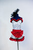 White and silver sequined shorts with black and white piano keys,red ruffles & a large red bow. Matching top with ruffle accent, black piping & black hairpiece, Front