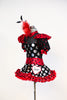 High neck bodysuit with pouf sleeves and keyhole back & varying patterns of polk-a-dot . Has a matching ruffled red tulle skirt and large red/black hairpiece, Side