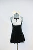 Black stretch velvet dress with attached panty has an ivory ruffled bib, black button and bow-tie accent. Comes with large, ivory bow, hair accessory. Front