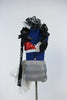 Costume is a silver-red sequined, bra, with single-shoulder, ruffled, sequined shrug.shorts have swirl-pattern,crystal belt and large white pouf on  hip.  Front