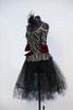 Gold/silver glitter pattern on black stretch velvet with off-the shoulder bodice and pep-plum rests on black tulle romantic tutu. Comes with black head piece. Side