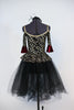 Gold/silver glitter pattern on black stretch velvet with off-the shoulder bodice and pep-plum rests on black tulle romantic tutu. Comes with black head piece. Back