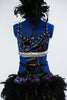 Purple and turquoise glitter stretch bodysuit with open sides, glittered band and  pull on skirt of black chandelle feathers. Comes with feather hair accessory. Front zoom