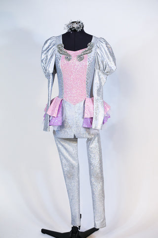 Full silver iridescent unitard with sequined hip ruffles and pink sequined front with jeweled appliques. Long sleeves have pouffed upper arm. (with hair piece). Front Full