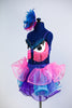 Blue sequined bra top that has monster eyes and pink fringe, Skirt is layers of twisty organza in bright pink, turquoise and purple. comes with hair piece, Side