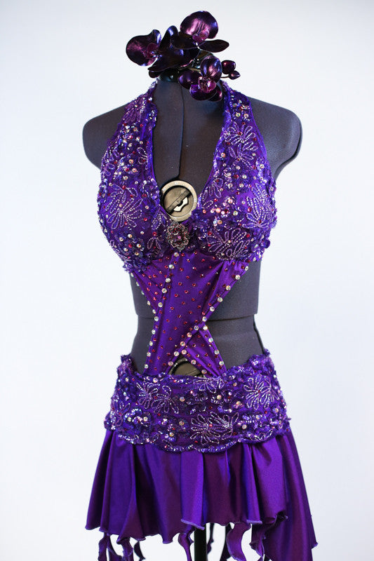 Purple dress has a built in bra attached to the skirt with front cross-over crystalled bands. Skirt has attached short & wide band of French beaded lace. Front zoom