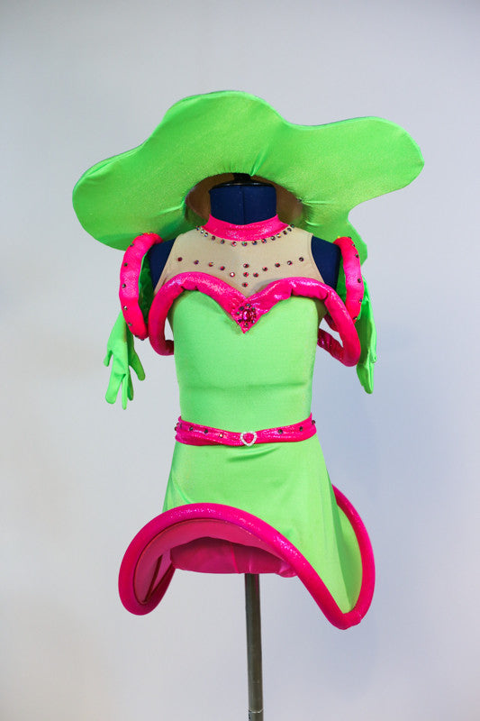 Neon green dress with attached shorts and mesh neckline Clear plastic tubing gives hooping effect. Matching gloves and a large hat in shape of a fried egg. Front