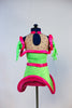Neon green dress with attached shorts and mesh neckline Clear plastic tubing gives hooping effect. Matching gloves and a large hat in shape of a fried egg. No hat