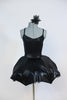 2 piece costume is black, leather-like fabric with a matching tutu type skirt with shaped boning  to a to create an umbrella effect with crystal raindrops. Front