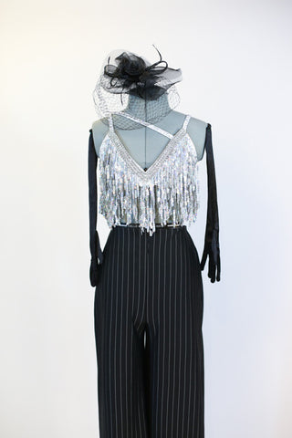 Black pin-stripe Zoot-Suit pant with a white/silver sequined &crystal bra that has fringe of dangling beads. Includes black headpiece and long gloves . Front