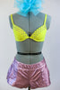 Pink metallic, lined, leather shorts, accompany a bright yellow bra with crystals and a silky floral jacket. Comes with a large aqua hair accessory. Without jacket