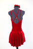Deep red stretch velvet dress with attached bottoms. Criss-cross straps and Swarovski crystals with large center ruby coloured accent. Comes with hair piece. Back