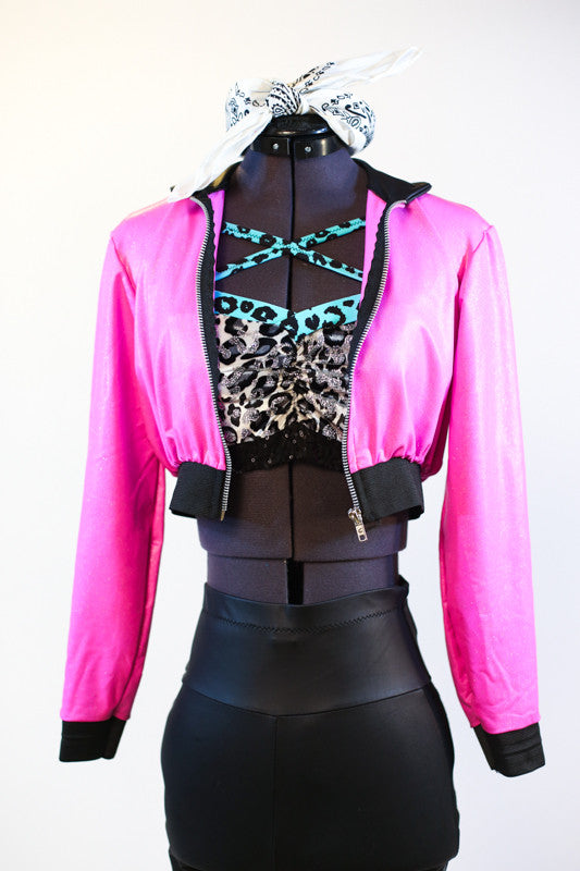 Hot pink crop sparkle jacket, with "Pink Ladies" on back. Comes with black leathery leggings with mesh side & a black/white/silver/aqua half top. Zoomed