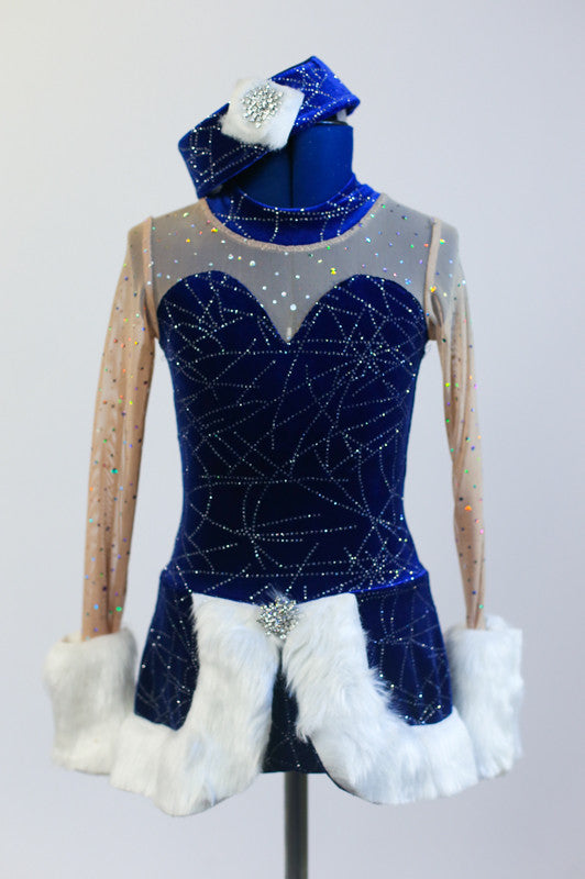 Royal blue, sequined velvet dress has sweetheart neckline with covered clear mesh. The skirt and wrists have a wide white fur trim & a matching velvet pill hat.Front zoomed
